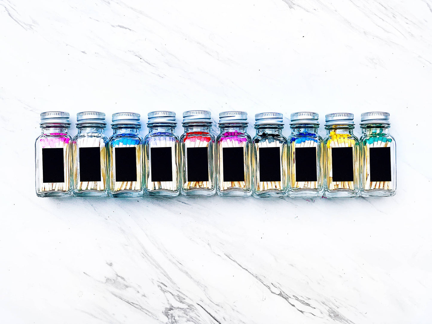 Colorful Wooden Matches In Little Glass Bottle