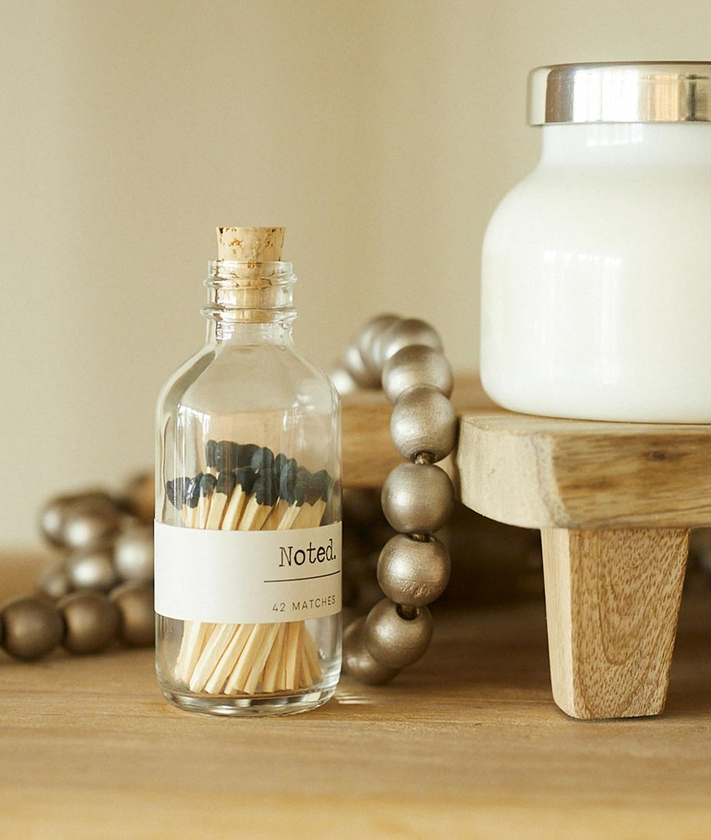 Noted Matches in Glass Bottle